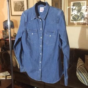 Levi’s pearl snap western style denim shirt.